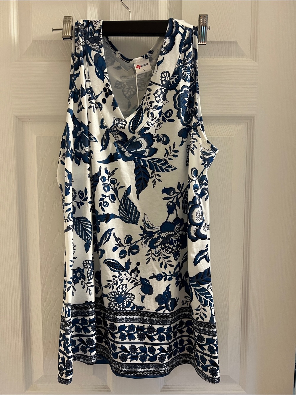 Sleeveless White Tank Top with Navy Floral Print